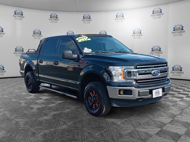 used 2018 Ford F-150 car, priced at $26,226