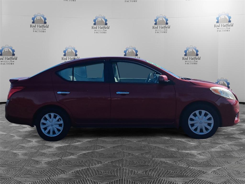 used 2013 Nissan Versa car, priced at $5,752