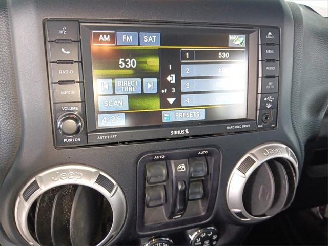 used 2015 Jeep Wrangler Unlimited car, priced at $23,580