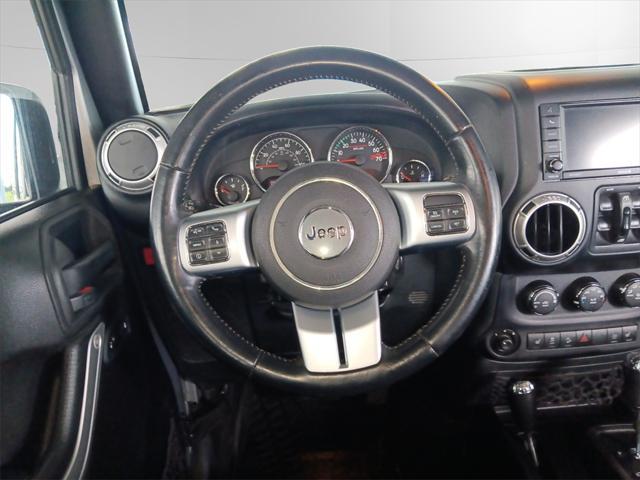 used 2015 Jeep Wrangler Unlimited car, priced at $23,580
