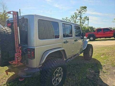 used 2015 Jeep Wrangler Unlimited car, priced at $23,888