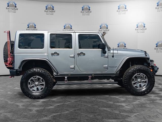 used 2015 Jeep Wrangler Unlimited car, priced at $23,580