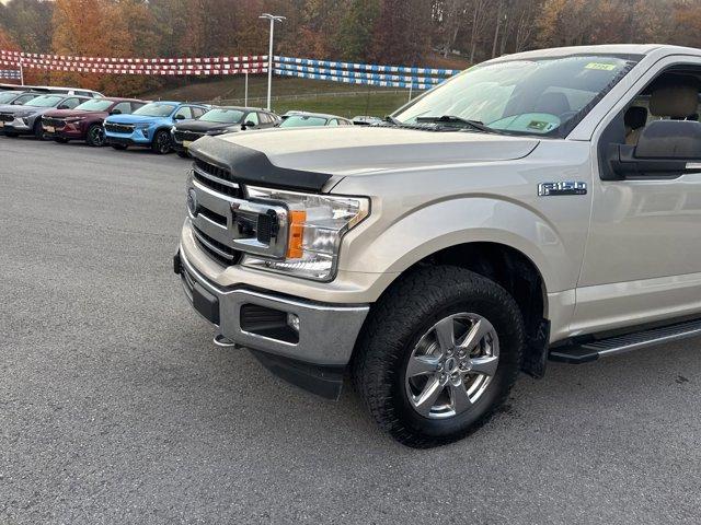 used 2018 Ford F-150 car, priced at $26,265