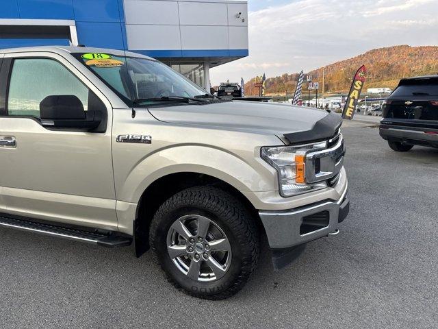 used 2018 Ford F-150 car, priced at $26,265