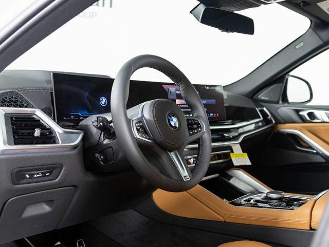 new 2025 BMW X6 car, priced at $85,155