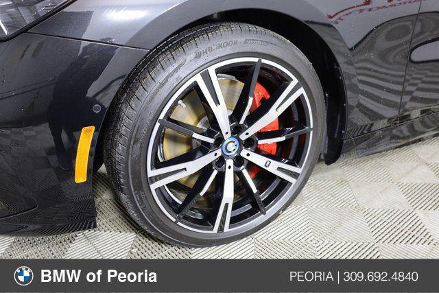 used 2024 BMW i5 car, priced at $79,900