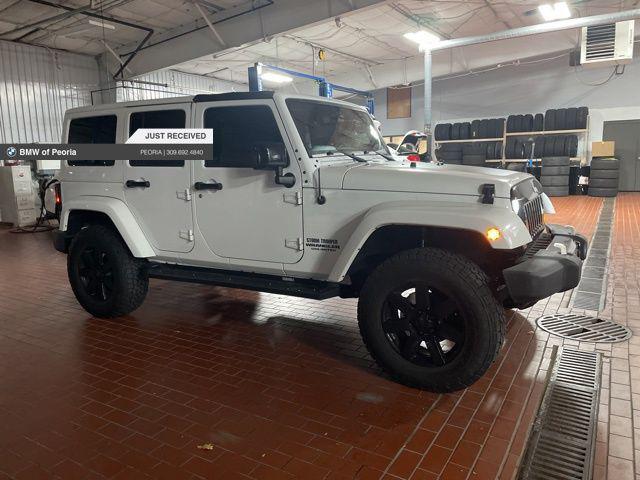 used 2014 Jeep Wrangler Unlimited car, priced at $19,990