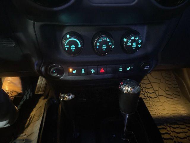 used 2014 Jeep Wrangler Unlimited car, priced at $19,990