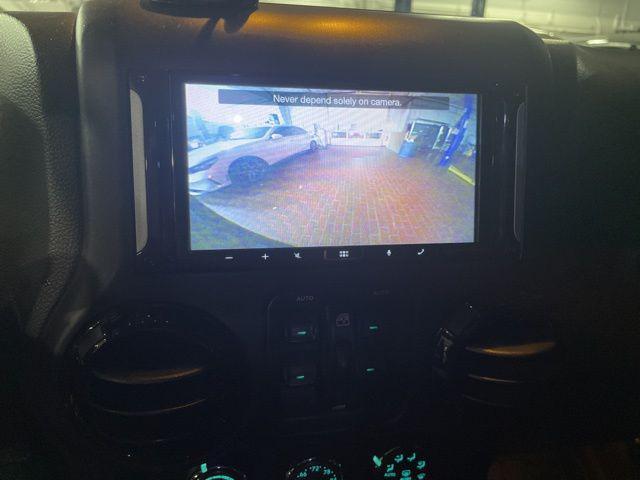 used 2014 Jeep Wrangler Unlimited car, priced at $19,990