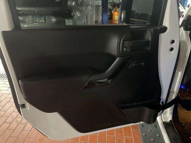 used 2014 Jeep Wrangler Unlimited car, priced at $19,990