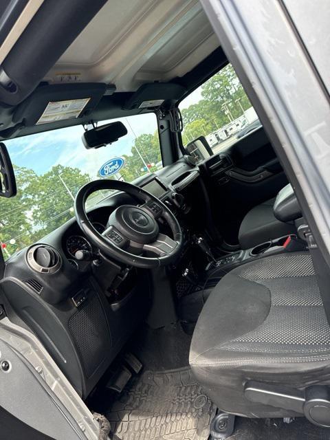 used 2016 Jeep Wrangler Unlimited car, priced at $20,473