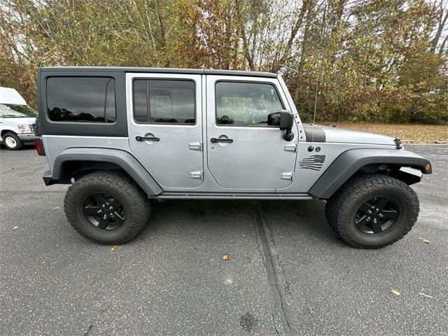 used 2016 Jeep Wrangler Unlimited car, priced at $19,873