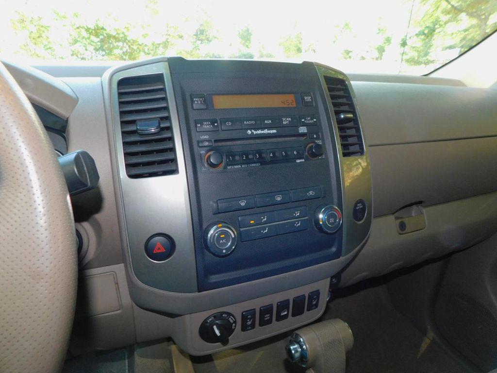 used 2009 Nissan Frontier car, priced at $13,600