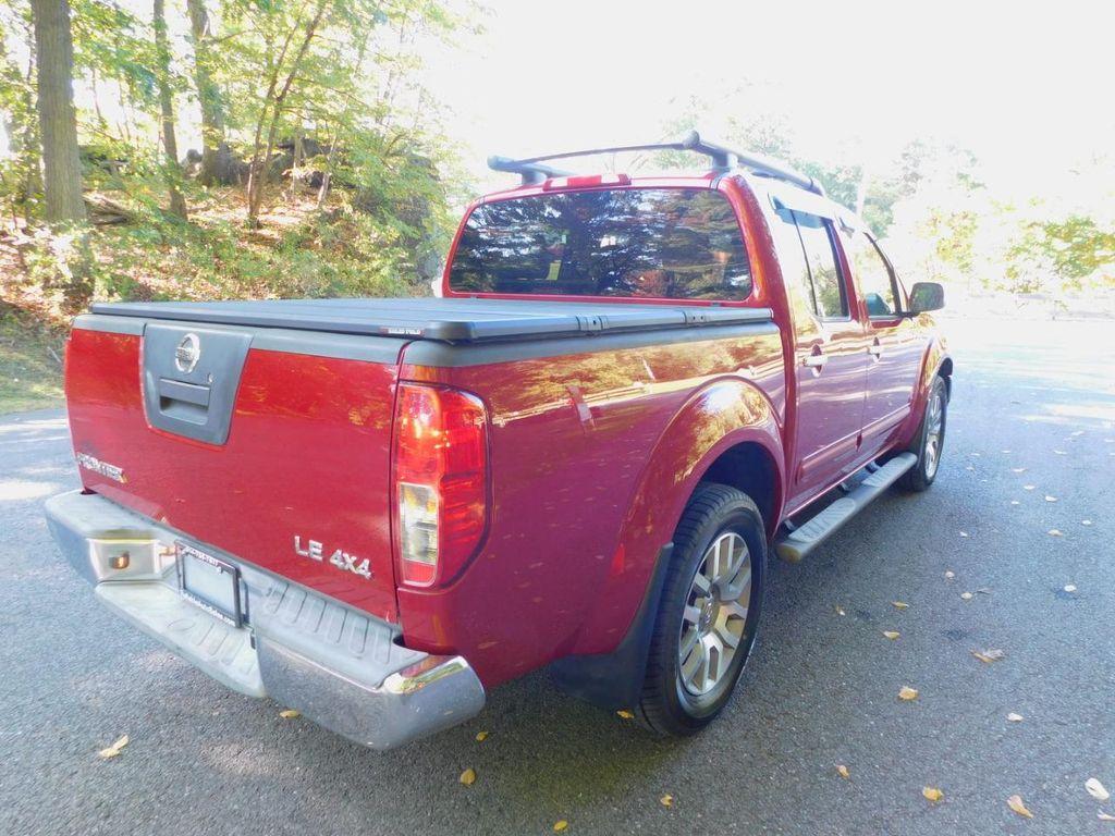 used 2009 Nissan Frontier car, priced at $13,600