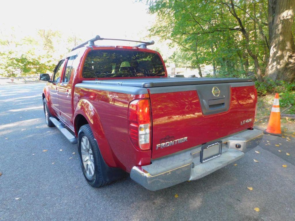 used 2009 Nissan Frontier car, priced at $13,600