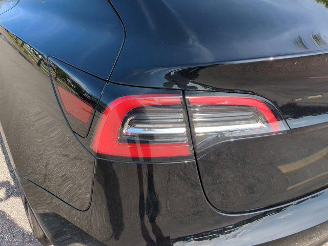 used 2023 Tesla Model 3 car, priced at $25,964