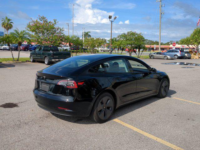 used 2023 Tesla Model 3 car, priced at $25,964