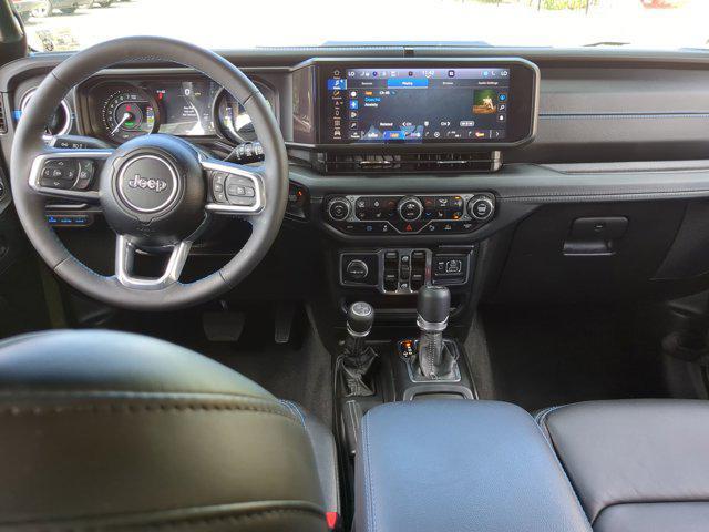 used 2024 Jeep Wrangler 4xe car, priced at $49,477