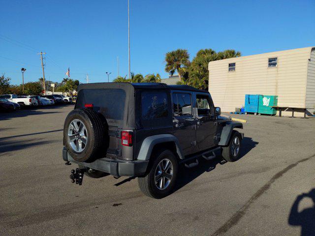 used 2016 Jeep Wrangler Unlimited car, priced at $19,891