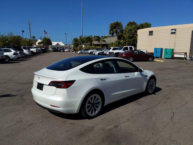 used 2023 Tesla Model 3 car, priced at $29,591