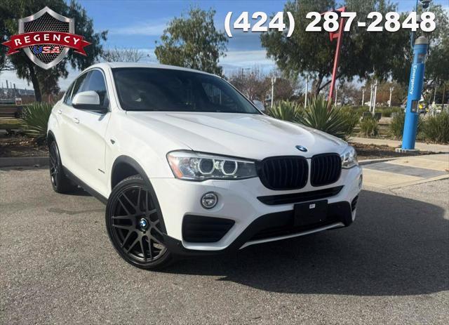 used 2016 BMW X4 car, priced at $18,885