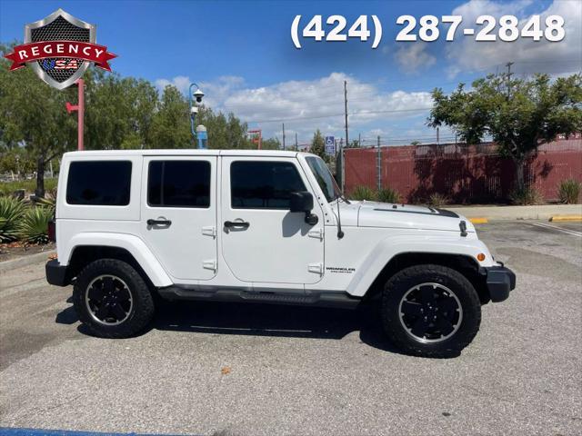 used 2012 Jeep Wrangler Unlimited car, priced at $18,885