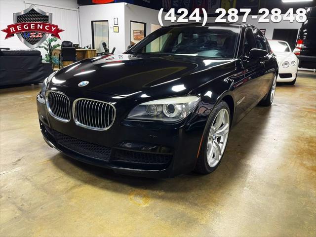used 2012 BMW 750 car, priced at $12,885