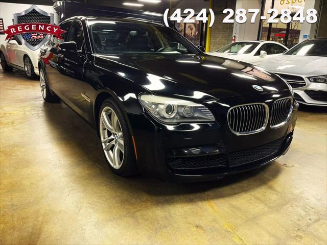 used 2012 BMW 750 car, priced at $12,885