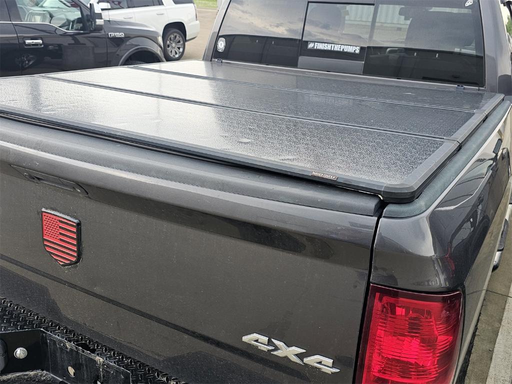 used 2018 Ram 1500 car, priced at $23,518