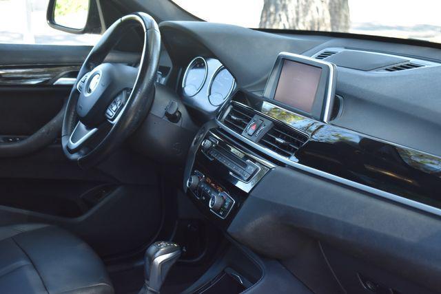 used 2018 BMW X1 car, priced at $19,990