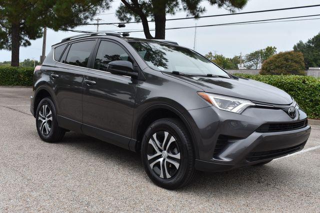 used 2018 Toyota RAV4 car, priced at $17,990