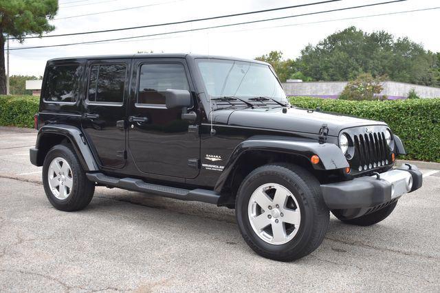 used 2011 Jeep Wrangler Unlimited car, priced at $16,990