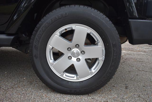 used 2011 Jeep Wrangler Unlimited car, priced at $16,990