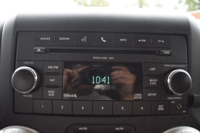 used 2011 Jeep Wrangler Unlimited car, priced at $16,990