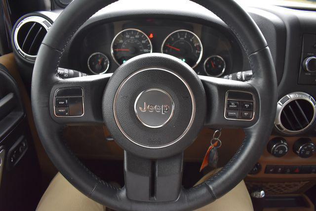 used 2011 Jeep Wrangler Unlimited car, priced at $16,990