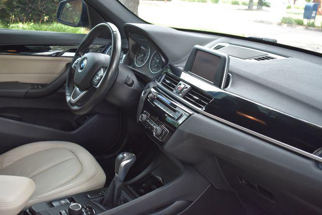 used 2018 BMW X1 car, priced at $16,990