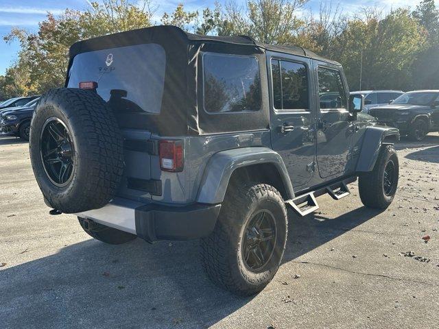 used 2014 Jeep Wrangler Unlimited car, priced at $19,491