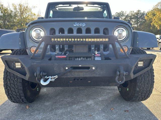 used 2014 Jeep Wrangler Unlimited car, priced at $19,491