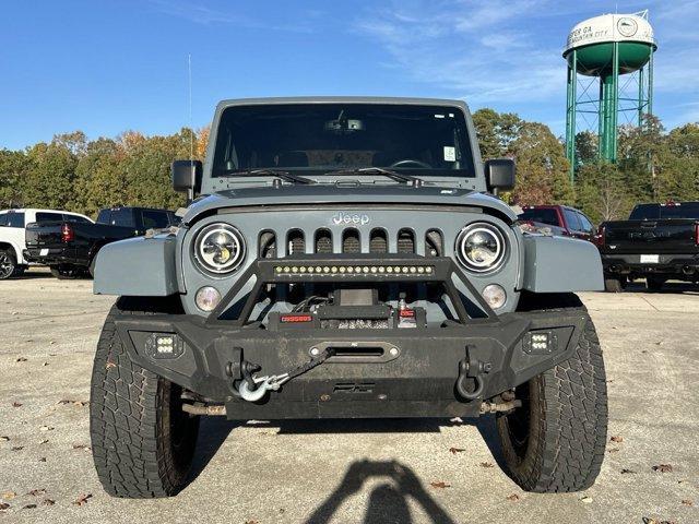 used 2014 Jeep Wrangler Unlimited car, priced at $19,491