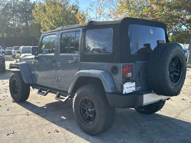 used 2014 Jeep Wrangler Unlimited car, priced at $19,491