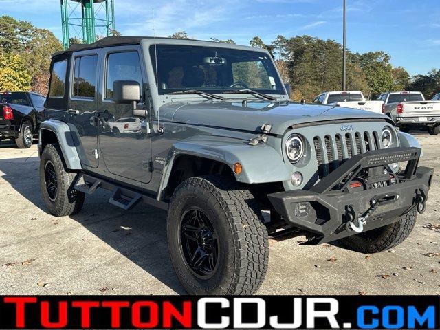 used 2014 Jeep Wrangler Unlimited car, priced at $19,491