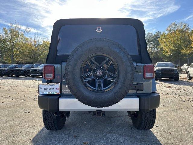 used 2014 Jeep Wrangler Unlimited car, priced at $19,491