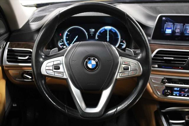 used 2016 BMW 750 car, priced at $23,999