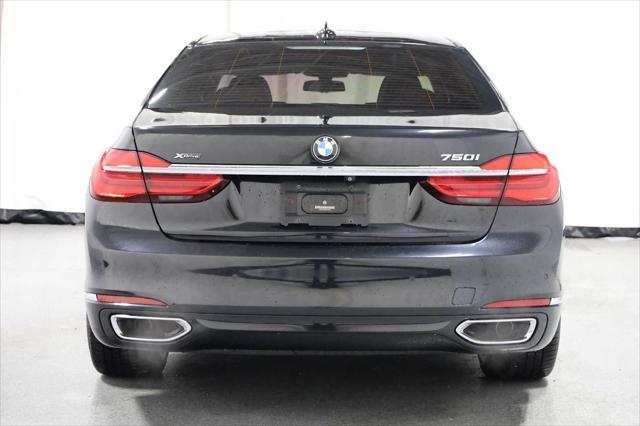 used 2016 BMW 750 car, priced at $23,999