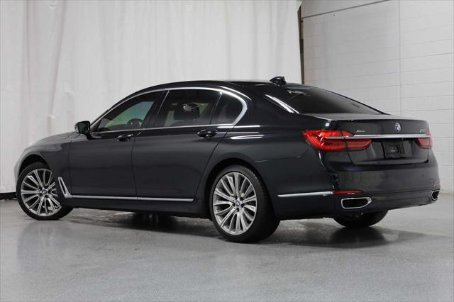 used 2016 BMW 750 car, priced at $23,999