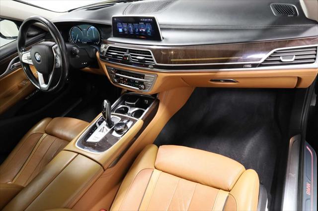 used 2016 BMW 750 car, priced at $23,999