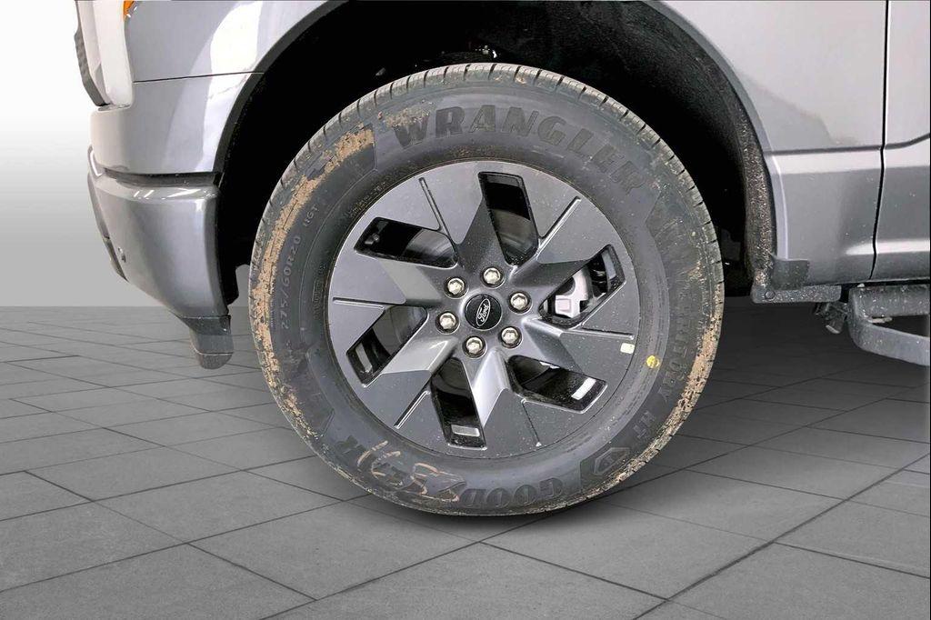 new 2025 Ford F-150 Lightning car, priced at $66,688