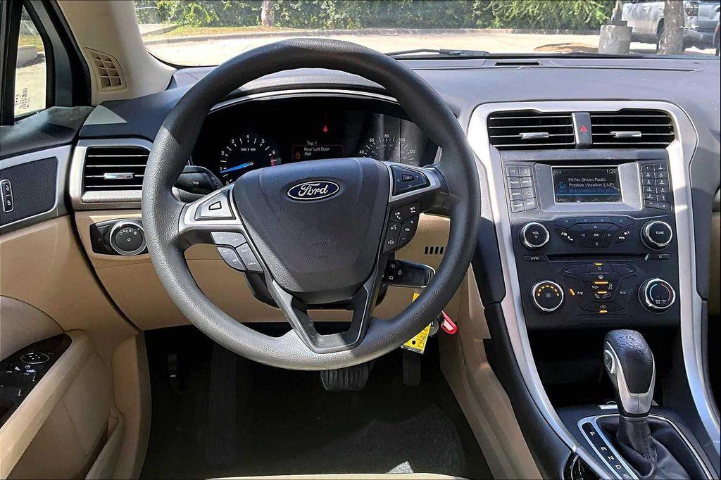 used 2015 Ford Fusion car, priced at $7,581