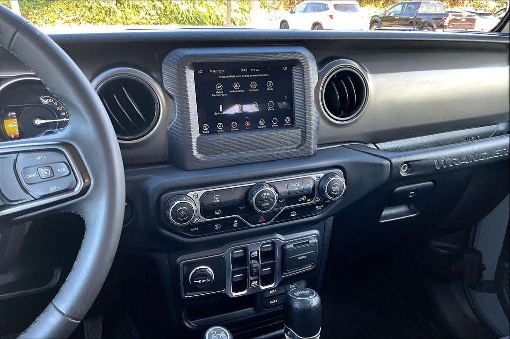 used 2023 Jeep Wrangler 4xe car, priced at $26,682