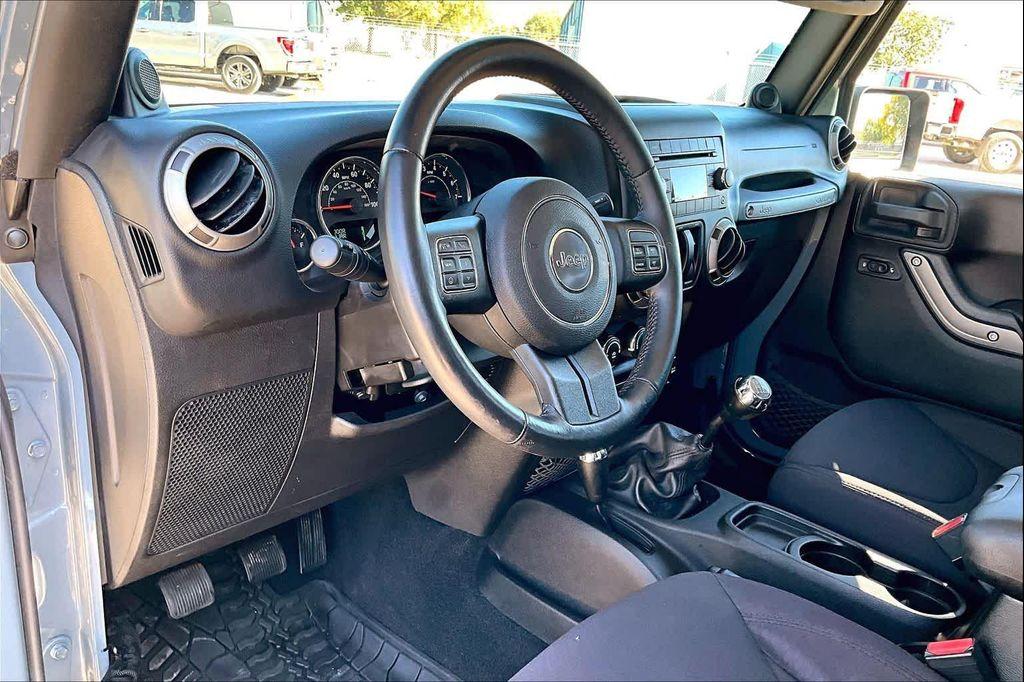 used 2014 Jeep Wrangler car, priced at $17,971